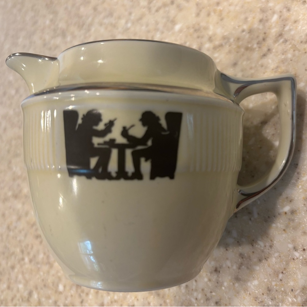 Vintage Cream Teapot with Black Silhouette Design